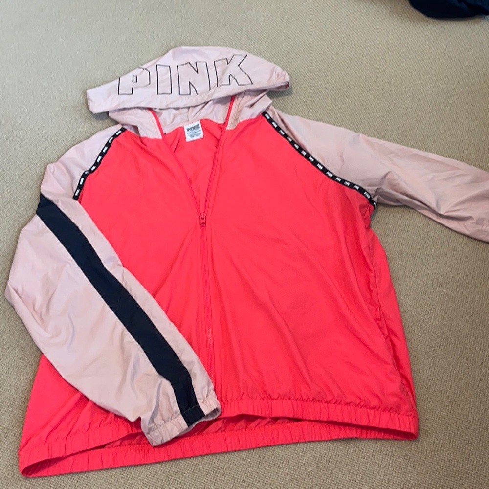 pink brand zip up wind breaker size medium